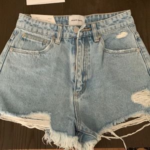 High-waisted cut off denim shorts, tags on